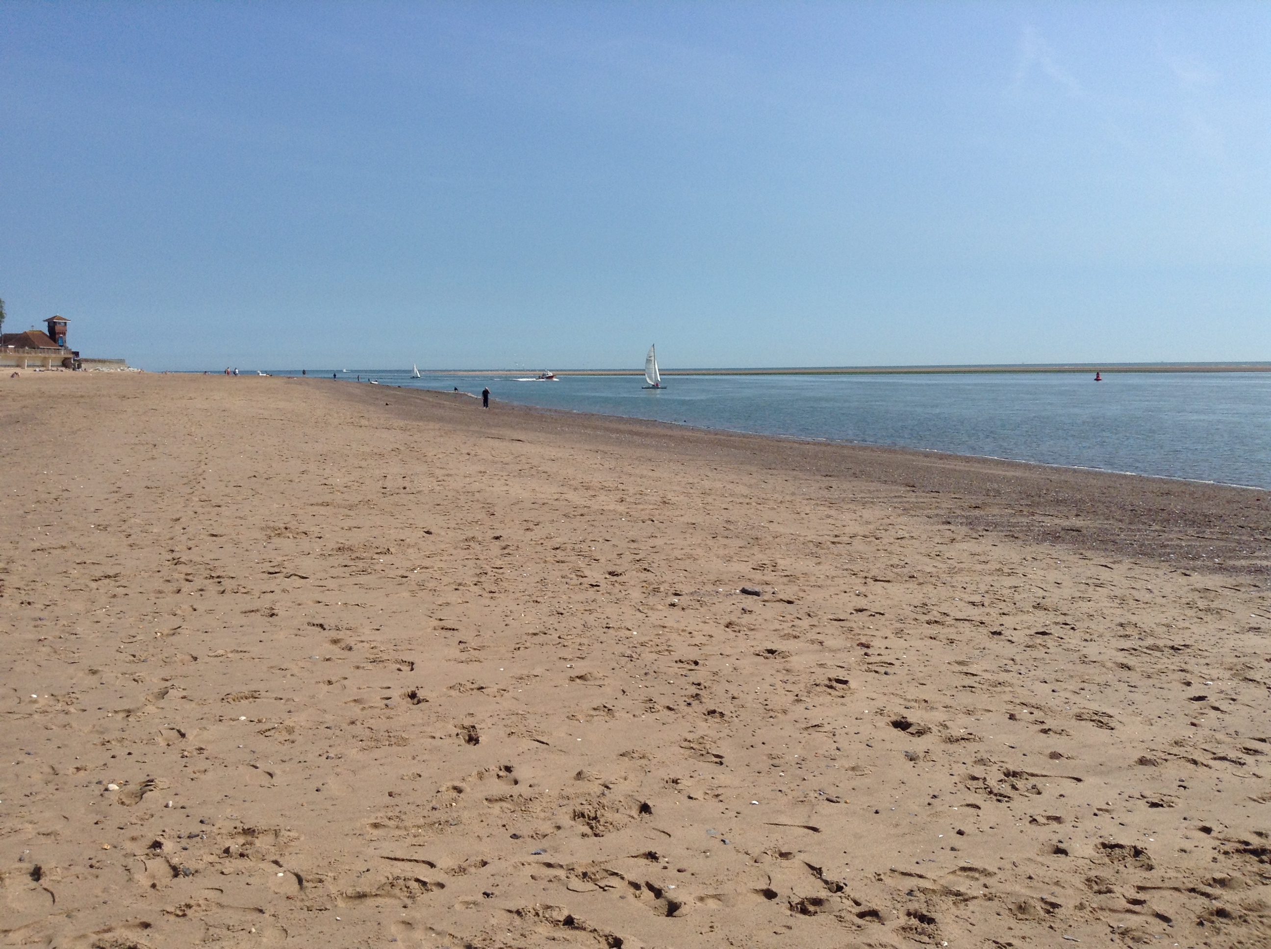 View along the water's edge on beach opposite Channel View
